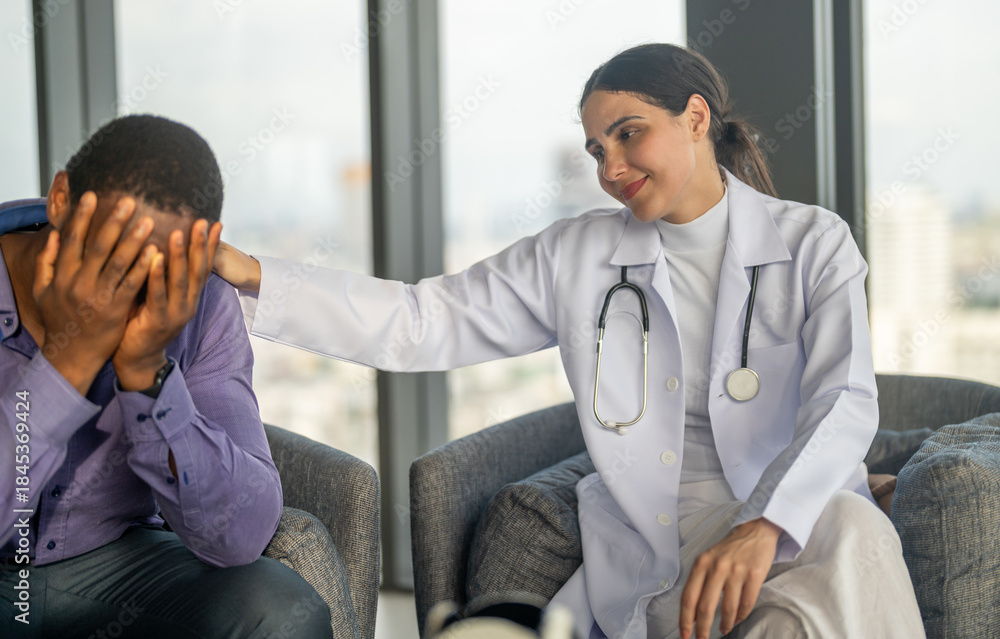 Obraz premium Doctor comforting depressed man during mental health consultation, showing empathy emotional support, psychiatric care and professional therapy in hospital for mental wellness, mental health awareness