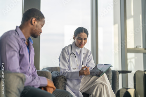 Tableau sur toile Doctor comforting depressed man during mental health consultation, showing empat