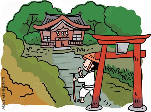 山の中の神社にお参りするお遍路さん