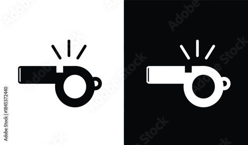 A striking visual depiction showcases two identical referee whistles presented in opposing black and white color schemes against contrasting backgrounds high quality professional