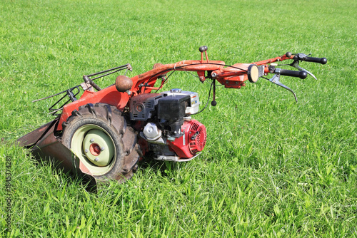 The red lawn mower
