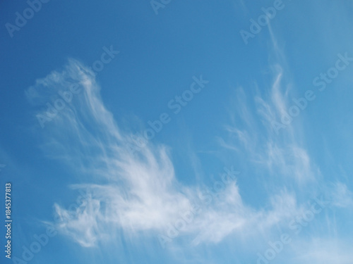 Soft atmospheric haze and thin cloud texture overhead 