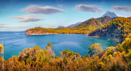 Fototapeta Naklejka Na Ścianę i Meble -  Amazing summer view of Mediterranean seascape/ Stunning morning view of small azure bay in outskirts of Tekirova village vith Tahtali peak on background. Beauty of nature concept background.