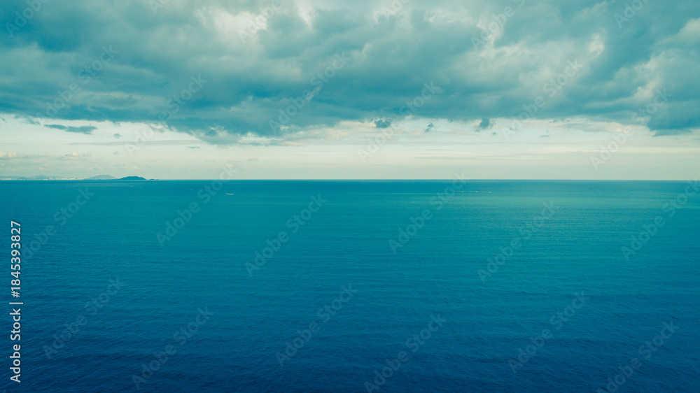 Obraz premium Aerial view of blue sea and sky landscape