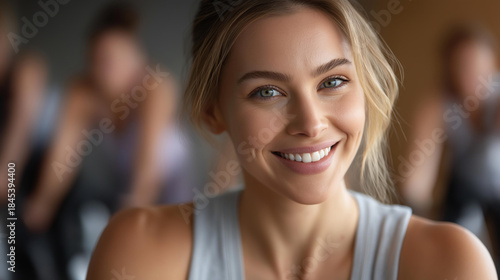 Faceless portrait of happy woman doing stationary bicycle exercises with group of people, cycling class participation, spin workout session, group cardio training, defocused person Free Download Faceless portrait of happy woman doing stationary bicycle exercises with group of people, cycling class participation, spin workout session, group cardio training, defocused person - GFXLoad
