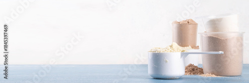 Wallpaper Mural Different protein powders flavors in plastic scoops Torontodigital.ca