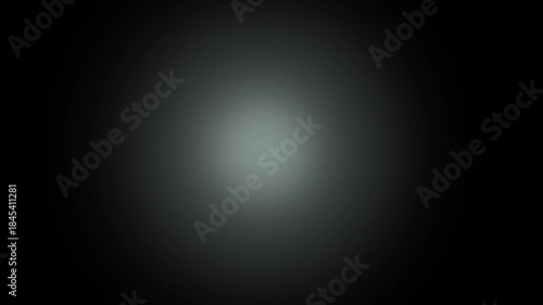 Central soft cyan glow with gradient fade on black background animation
