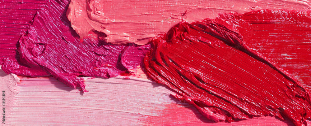 Fototapeta premium Abstract pink red texture vivid paint smear pattern with glossy strokes and creamy layers