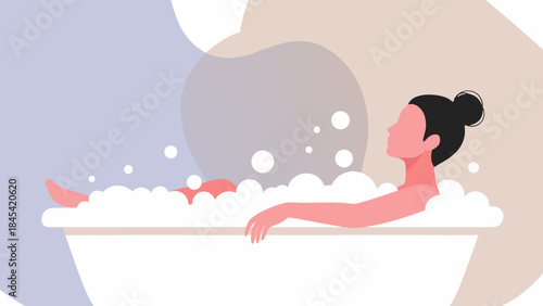 A woman relaxing in a bubble bath, enjoying a moment of peace and self-care.