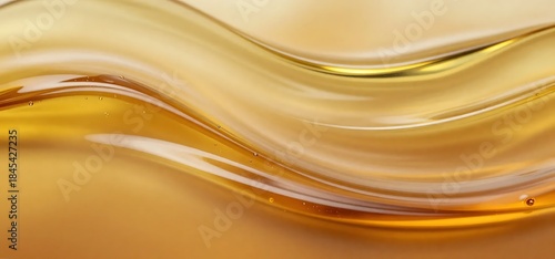 琥珀色に輝く透明な波状の液体背景