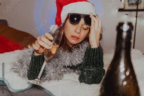 Drunk woman on new year's eve. The problem of alcoholism and loneliness during the Christmas and New Year holidays