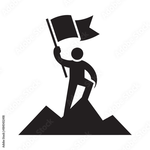 Silhouette of a person raising a flag on a mountain peak