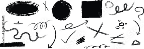 Collection of black ink scribbles and shapes on white background