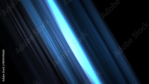 Diagonal blue light streaks on black background with abstract motion blur
