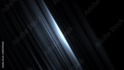Abstract white light streaks on black background with motion blur effect
