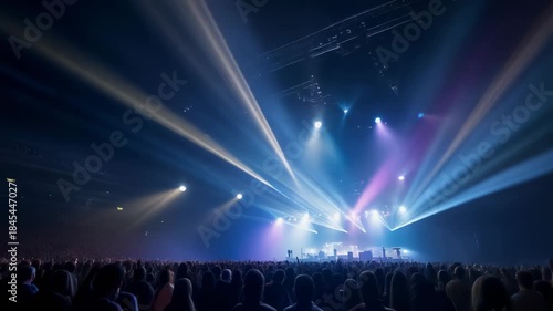 Vibrant concert scene with energetic crowd and colorful stage lights for live music events