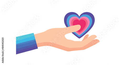 Gentle hand offers a colorful heart symbol to represent care kindness and compassion shared with others in a moment of giving and support.