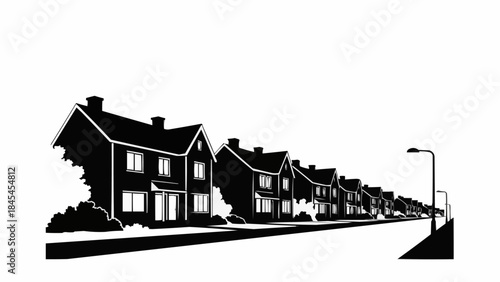 Row of identical houses on a street with a lamppost.