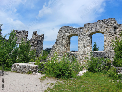 stone walls of old castle Samobor. Green plants on ruins. Croatia