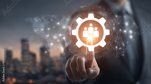 Businessman touching digital gear with people icon and global network teamwork technology