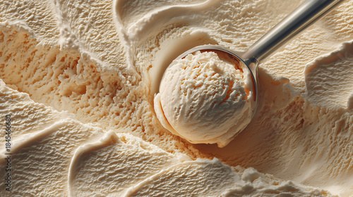 Picture of a small scoop of vanilla ice cream.