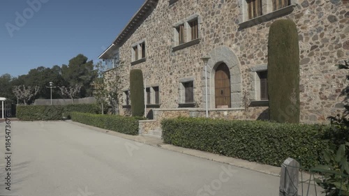 Old stone house Polecam jib door entrance facade windows left