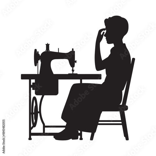 A vintage silhouette of a woman sewing with an old fashioned machine