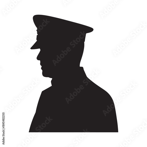 A stark silhouette of a man wearing a peaked cap and uniform
