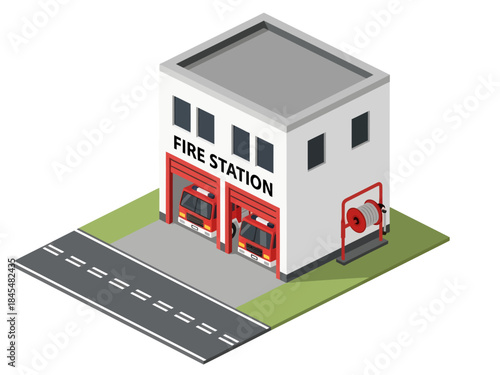 An isometric illustration of a white fire station building with two red fire trucks parked in its bays, "FIRE STATION" text, a red hose reel on the side, and an adjacent asphalt road with green grass