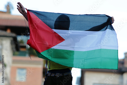 Protester Raises Palestinian Flag During Large Demonstration in Rome, Italy - October 2025