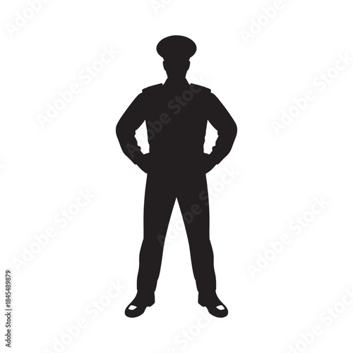 Silhouette of a person in uniform standing with hands on hips