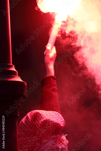 Masked Protester with Keffiyeh Climbs Lamp Post Holding Red Flare in Rome - October 2025