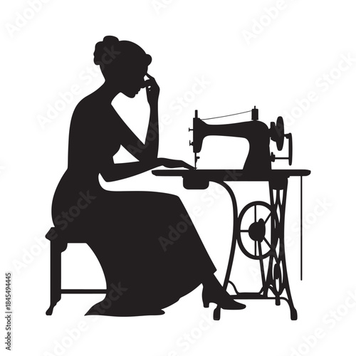 A vintage silhouette of a woman intently sewing with an antique machine