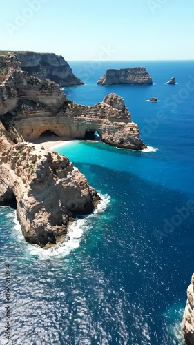 Aerial View of Dramatic Cliffs and Turquoise Waters of Algarve Coast, Portugal
