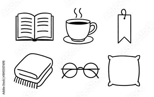 Cozy reading essentials: open book, hot drink, glasses, blanket, pillow, and bookmark