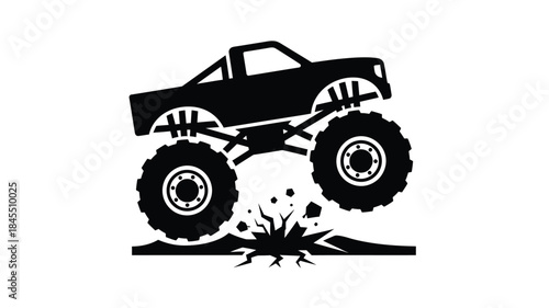A powerful monster truck jumps mid air creating a dynamic scene silhouette