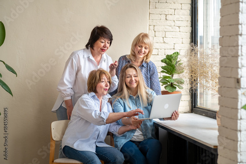 Group of senior people video chatting at home