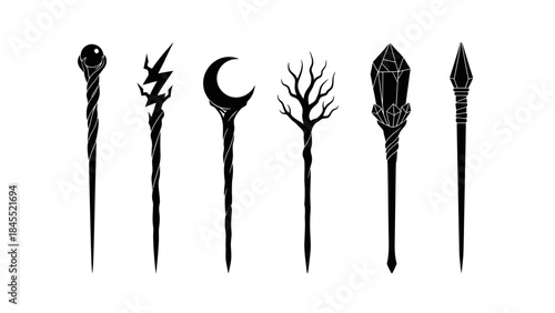 Set of mystical wands in silhouette for fantasy and magical concepts