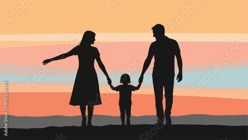 Silhouette of a family holding hands at sunset.