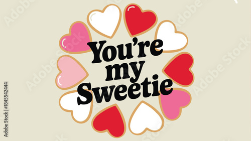 Colorful heart shaped cookies in circular arrangement on light beige background with you're my sweetie text, valentine's day theme