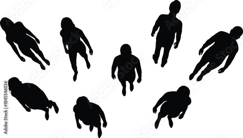 Top-down view of a group of abstract human figures in silhouette