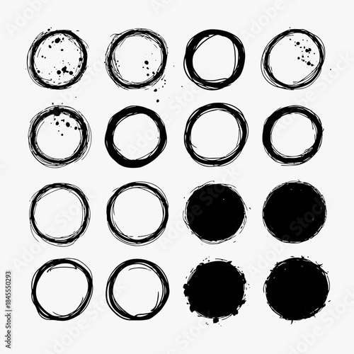 Collection of abstract black and white circles with various textures and splatters