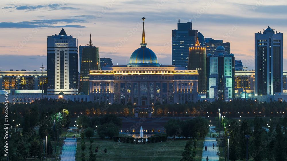 Obraz premium Close up view of Astana city day to night timelapse and the president's residence Akorda with park