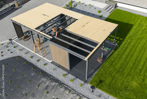 Workers Build a Structure in the Backyard During Day