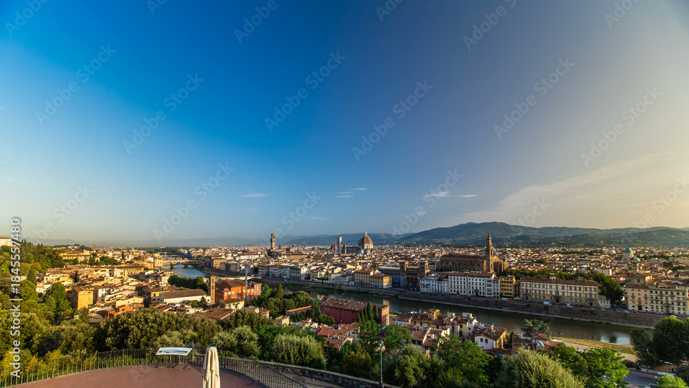 Obraz premium Top view of Florence city timelapse at sunrise with arno river bridges and historical buildings