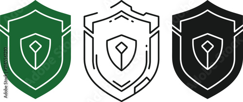 Three shields with green black and white colors and a diamond symbol in the center