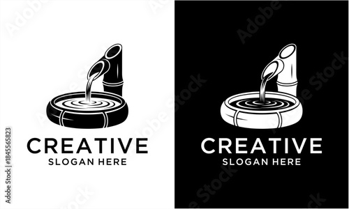 Bamboo water fountain with flowing water into a basin, a serene and natural design element.