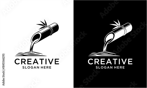 Bamboo water spout with flowing water, a natural and serene design element.