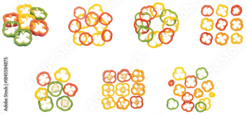 Colorful bell pepper rings arranged in creative patterns on a pristine white background