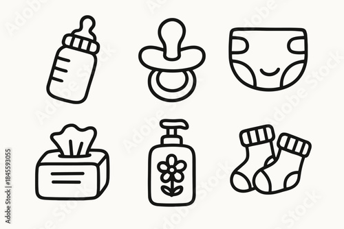 Baby care essentials icon set in black and white